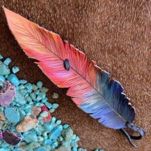 Summer vibe with lots of bright colors hand painted on a leather feather including red, orange and mixed in blues and greens. Black and blue lac