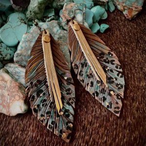 brown teal and leopard colors with gold bronze and rivets