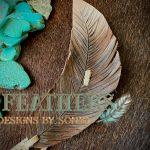 small curved brown and cream feather