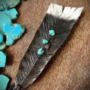 turkey feather with 4 turquoise stones