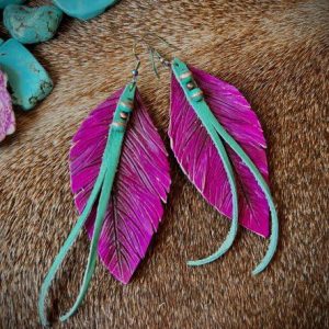 fuchsia earrings paired with turquoise lace and rivets