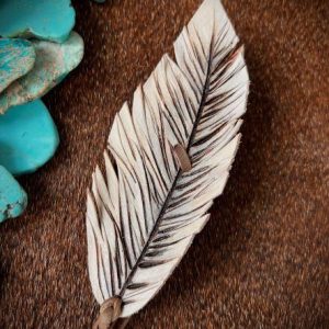small leather feather hat band white with dark brown staining