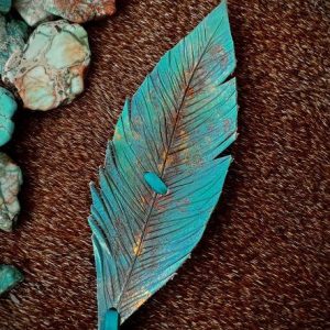 Turquoise green leather feather hat band with gold, bronze and teal deerskin lace