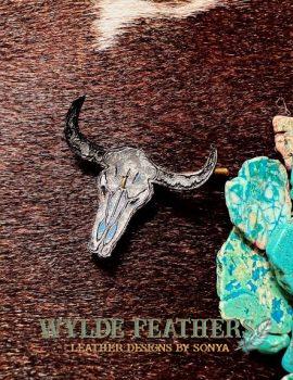 leather longhorn pin for cowboy hat decorated and painted by hand in silver, blue and black