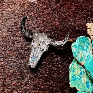 leather longhorn pin for cowboy hat decorated and painted by hand in silver, blue and black