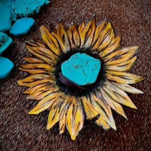 yellow and gold sunflower with dark brown center and turquoise how lite