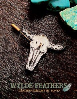 white and black longhorn hatpin hand painted and hand carved.