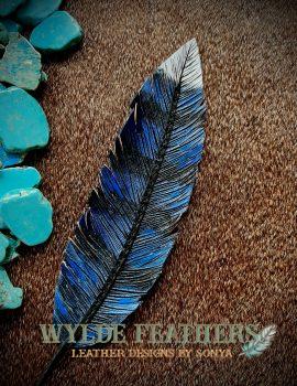 Blue, white and black jaybird feather with black lace stitching