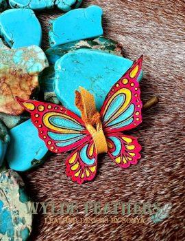 butterfly hand painted in hot pink, yellow and turquoise with center lace in yellow