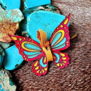 butterfly hand painted in hot pink, yellow and turquoise with center lace in yellow