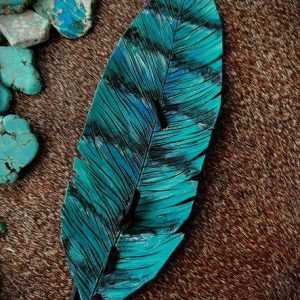 black, white and teal leather feather hat band with turquoise hints and black lace