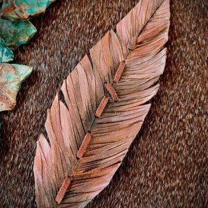 leather feather hat band with shades of mauve with metallic rose gold